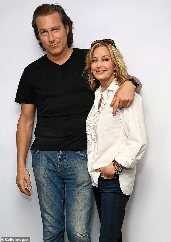 She explained that when she met John Corbett she felt 'just an attraction, a comfort'; they are pictured together in 2015