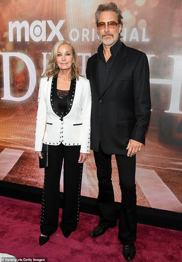 For her latest public appearance, Derek exuded a youthful glow as she posed in a snappy monochrome trouser suit that accentuated her still willowy frame