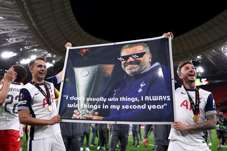 Sergio Reguilon and James Maddison holding a banner celebrating their team's victory.  The banner features their manager with sunglasses and a quote about winning in his second year.