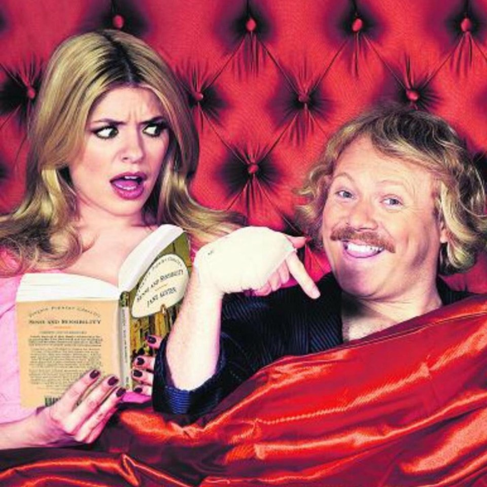 Holly Willoughby and Keith Lemon in bed reading "Sense and Sensibility."