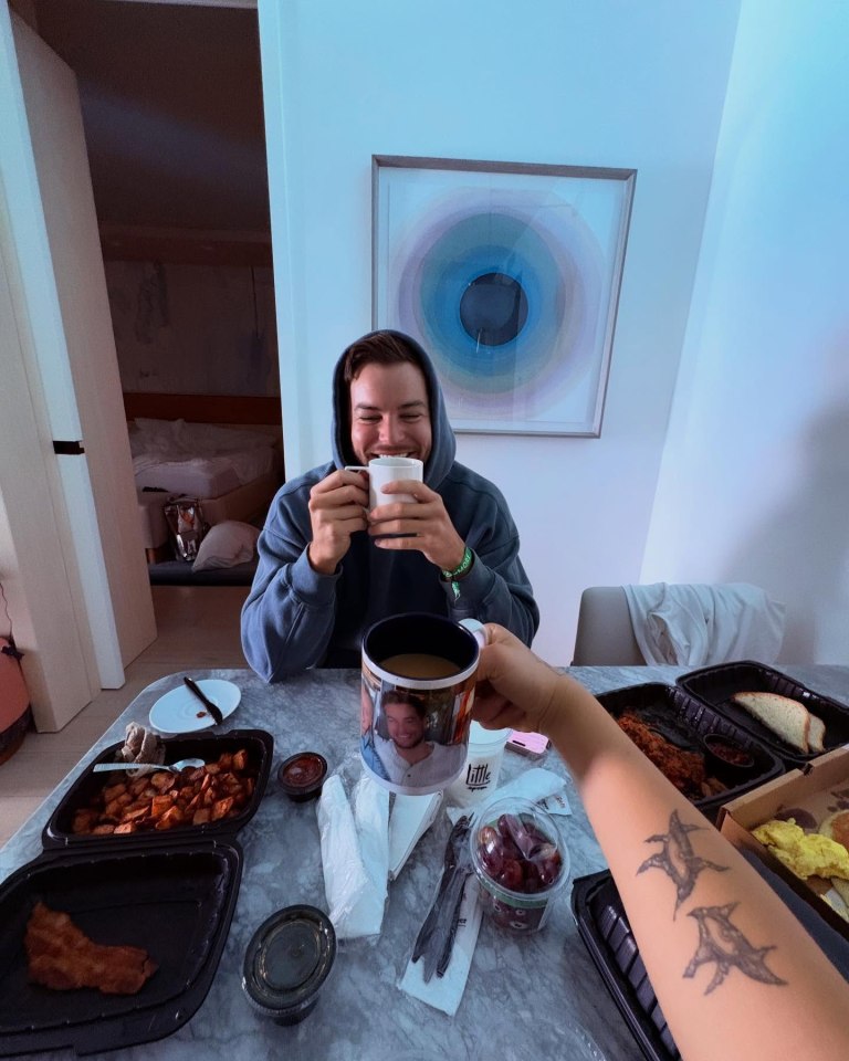 Man and woman enjoying breakfast together.