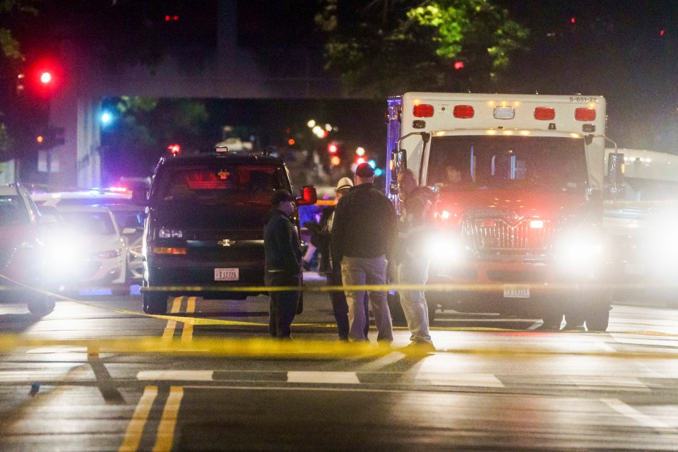 Police officers at a crime scene near the Capital Jewish Museum in Washington, DC.