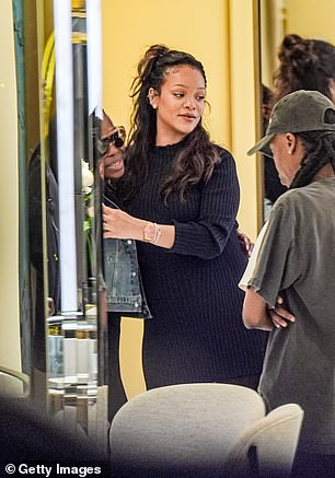 The singer looked in good spirits as she hugged a friend while indulging in some retail therapy