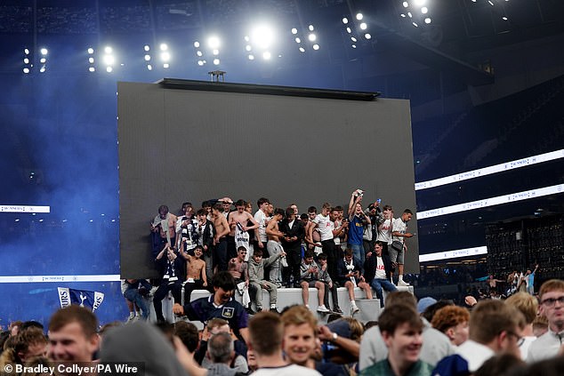 Fans stormed the pitch after winning the UEFA Europa League after a screening of the UEFA Europa League final at the Tottenham Hotspur Stadium