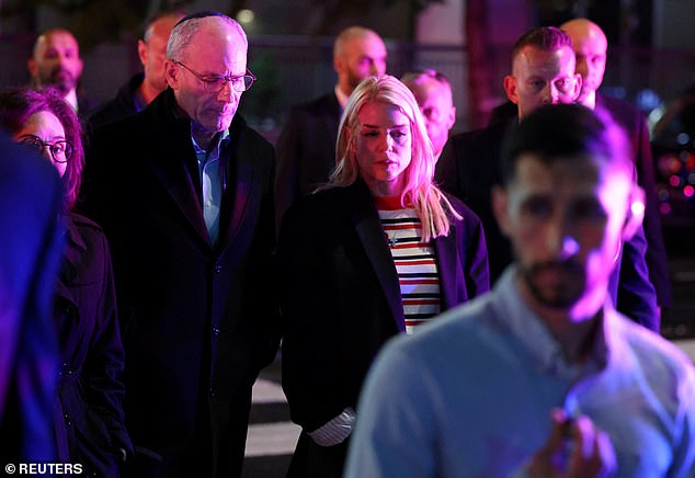 U.S. Attorney General Pam Bondi and Israeli Ambassador to the U.S. Yechiel Leiter arrive at the scene of the tragedy on Wednesday night