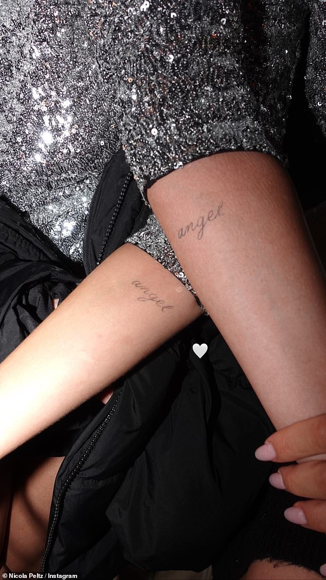 Nicola and Selena both have matching 'angel' tattoos, which the star previously shared in a snap on Instagram