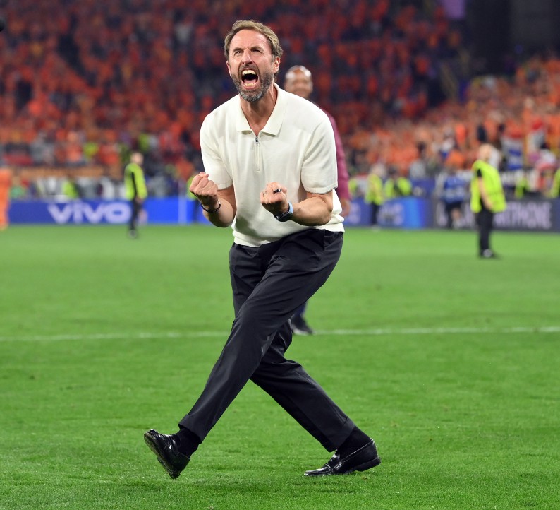 DORTMUND, GERMANY - JULY 10: England head coach Gareth Southgate celebrates victory with the fans after the UEFA EURO 2024 semi-final match between Netherlands and England at Football Stadium Dortmund on July 10, 2024 in Dortmund, Germany. (Photo by Stu Forster/Getty Images)