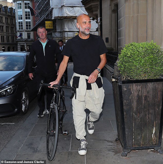 Manager Pep Guardiola looked slightly sweaty as he rolled up to the restaurant with his bike
