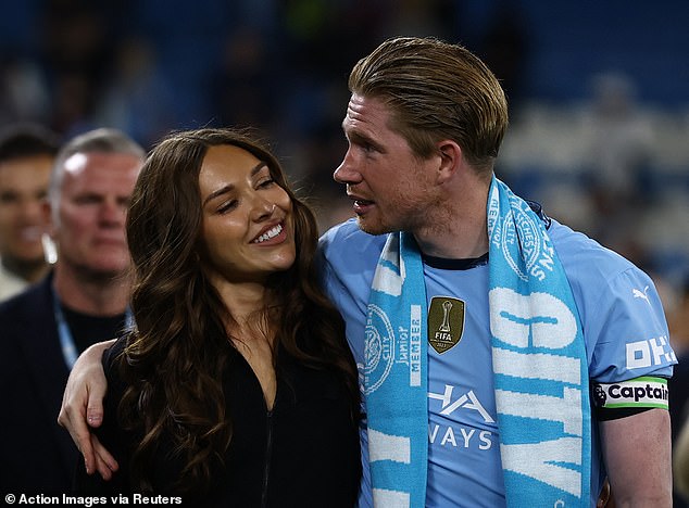 Joined by his family, including wife Michele, he took to the pitch after City beat Bournemouth
