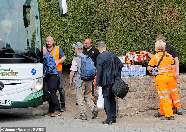 Staff were on hand with snacks and water bottles for the passengers who had been on the train