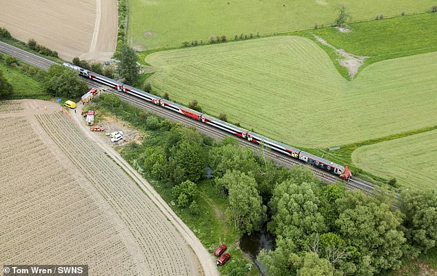The five-carriage train was left stuck on the railway while passengers were evacuated