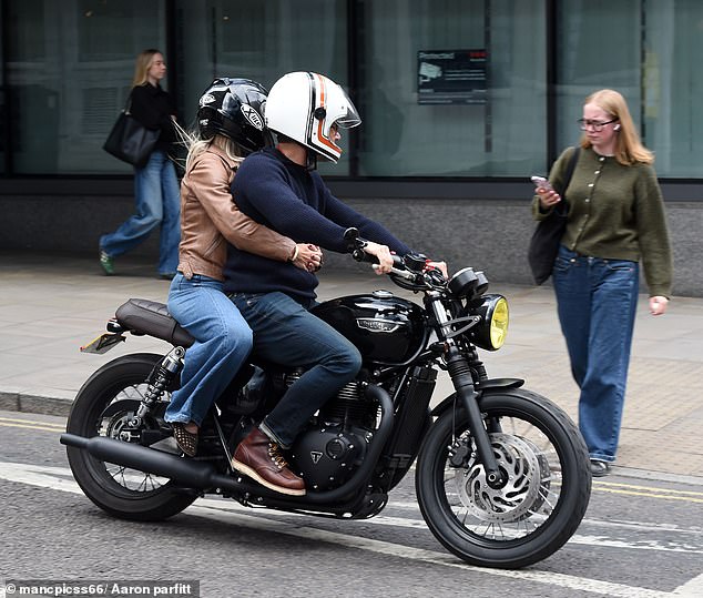 Looking stylish, Helen, 41, opted for a tan leather jacket as she embraced the biker-girl look