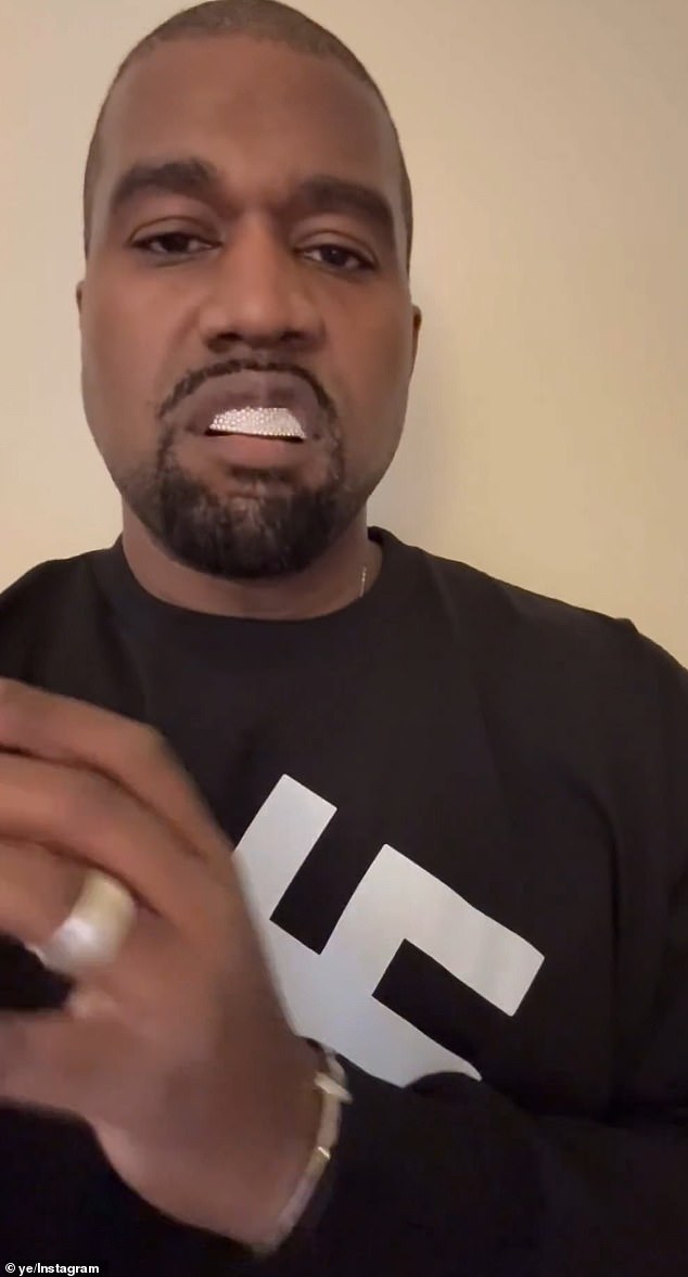 Ye - who's worn swastika and 'White Lives Matter' T-shirts - has repeatedly spoken about his disdain for Jewish people and his adoration of Nazi Germany dictator Adolf Hitler (pictured February 22)