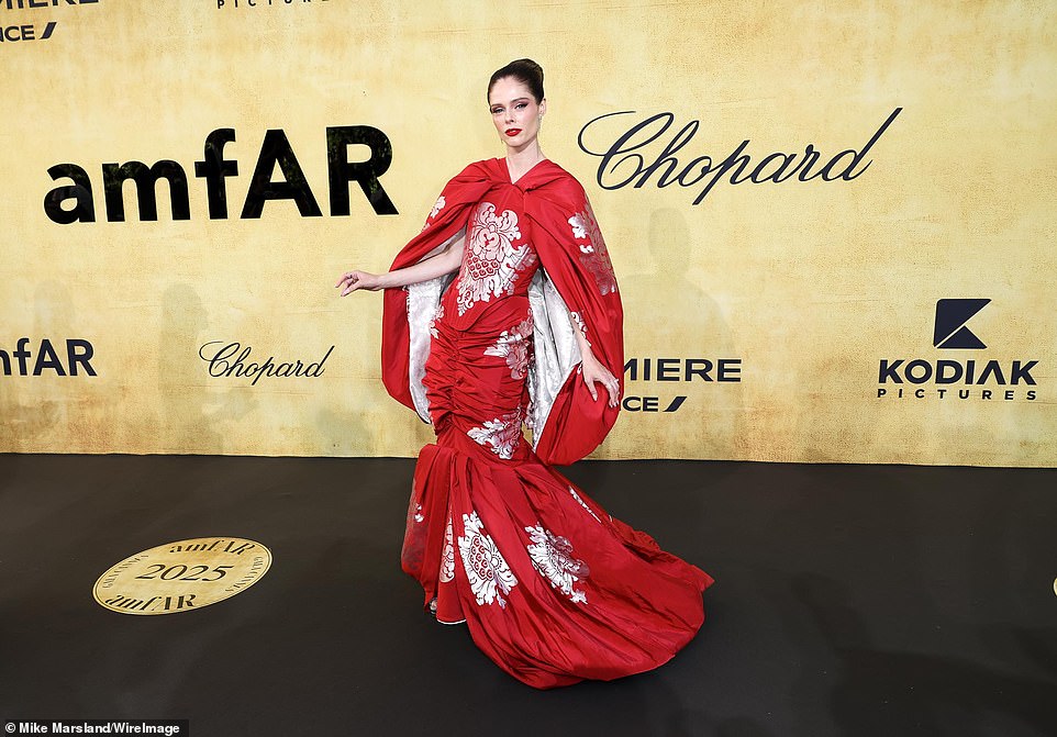 The Canadian model, 36, oozed confidence as she posed for a sea of cameras at the lavish event