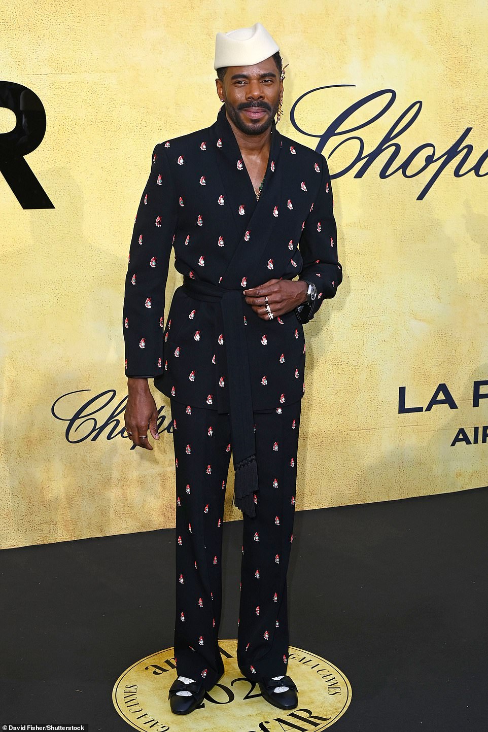 Colman Domingo stood out in a black tie-up jacket and matching trousers, which were both embellished with red gems