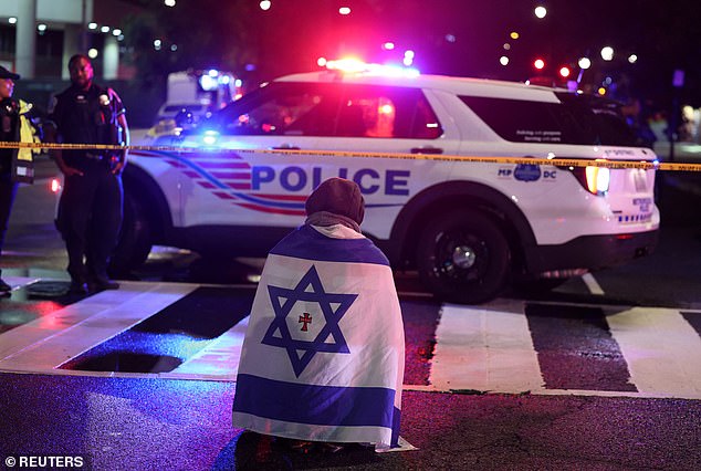 Emergency personnel work at the site where, according to the U.S. Homeland Security Secretary, two Israeli embassy staff were shot dead near the Capital Jewish Museum in Washington, D.C., U.S. May 21, 2025