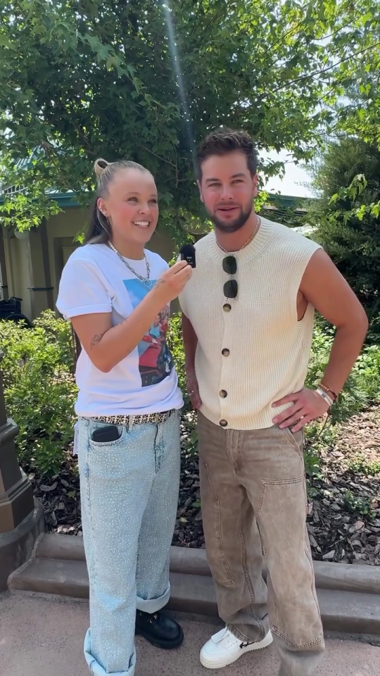 JoJo Siwa and Chris Hughes in a video interview.