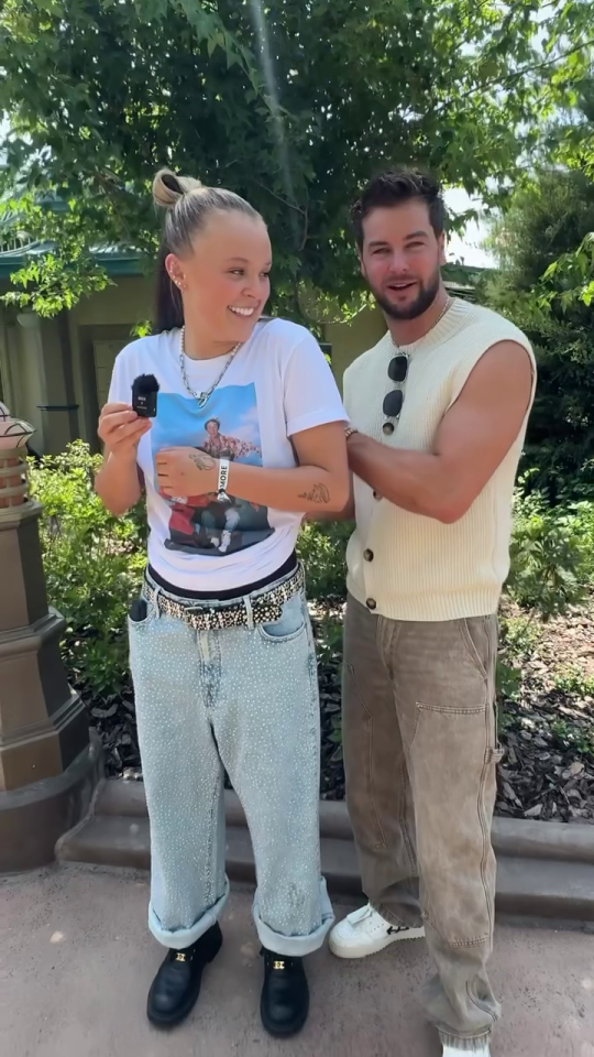 JoJo Siwa and Chris Hughes in a video together.