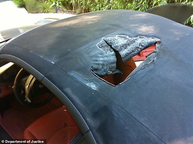 The jury was shown photos of the car showing the roof of the vehicle slashed