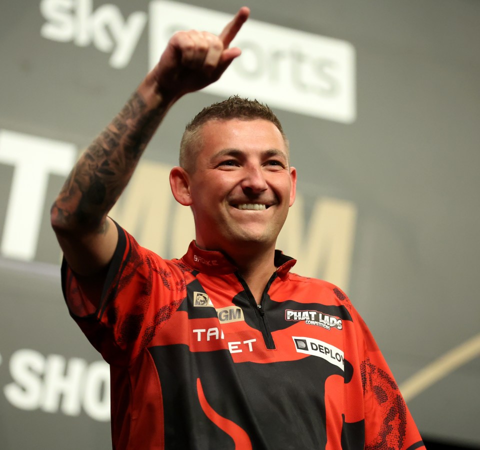 Nathan Aspinall celebrating a victory.
