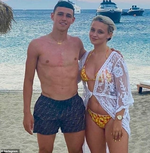 The WAG, pictured on holiday with Phil, usually stays out the spotlight