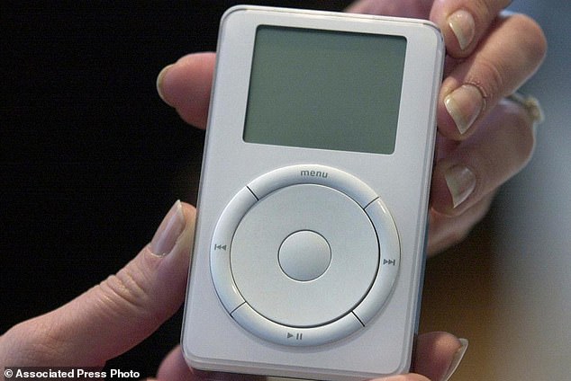 Apple's digital music player, iPod, is displayed after its introduction by Apple Computer Inc. chief executive officer Steve Jobs during a news conference, Oct. 23, 2001, in Cupertino, Calif. It was designed by Jony Ive
