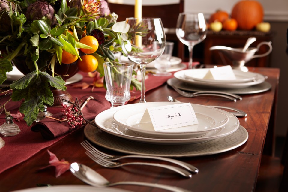 Autumnal table setting with place card for Elizabeth.