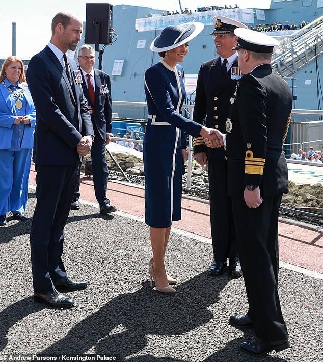 Keeping her look suitably nautical for the outing, the royal sported a navy and white £1,850 coat dress from British brand Suzannah London and a matching statement hat from Philip Treacy, first worn at Trooping the Colour in 2024
