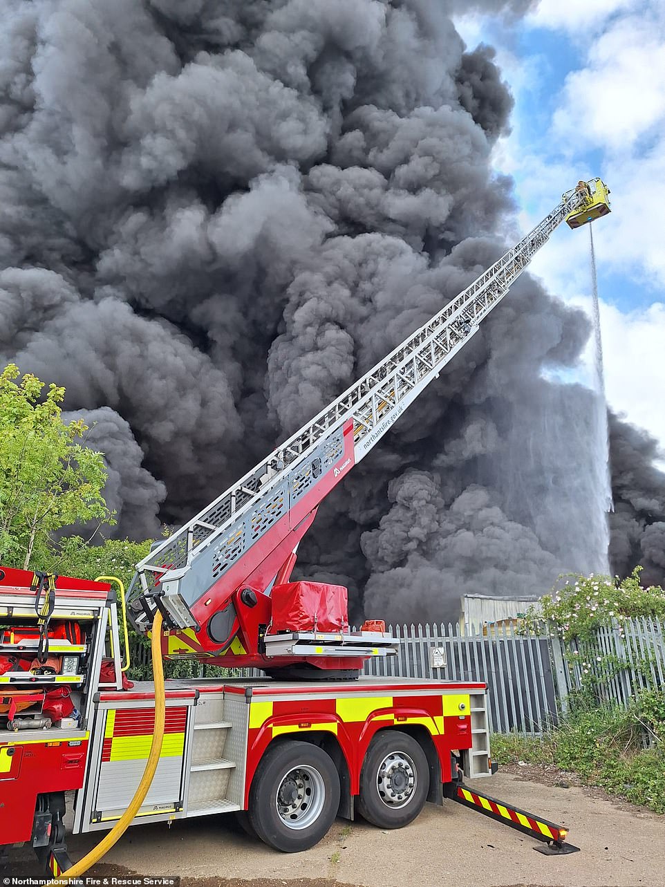 Ten crews arrived on the scene and evacuated staff from the warehouse while tackling the fire which is said to involve 'a large quantity of plastic'