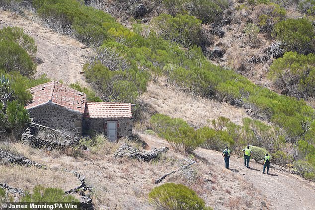 Members of the search and rescue team look for Jay near his last-known location, near to the village of Masca