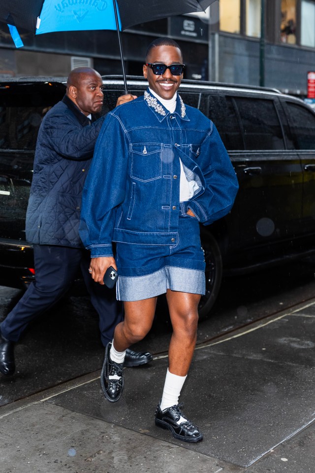 Ncuti Gatwa in Midtown, wearing a denim jacket and shorts.