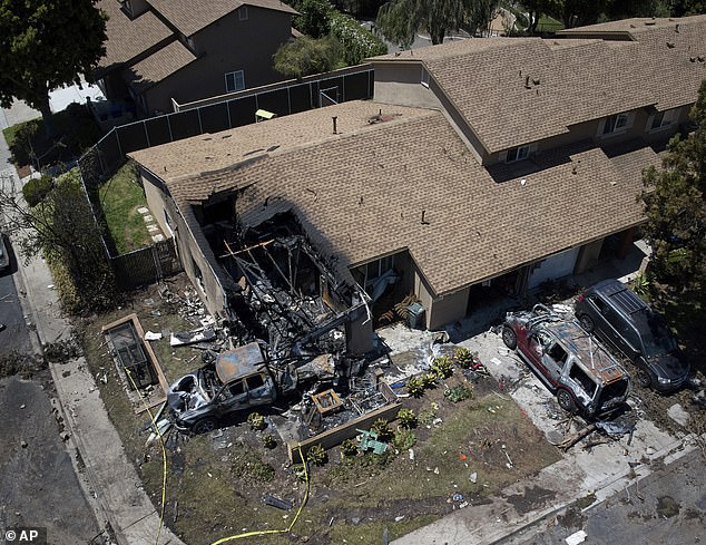 The home that was struck was completely destroyed, with its front heavily burned and its roof partially collapsed