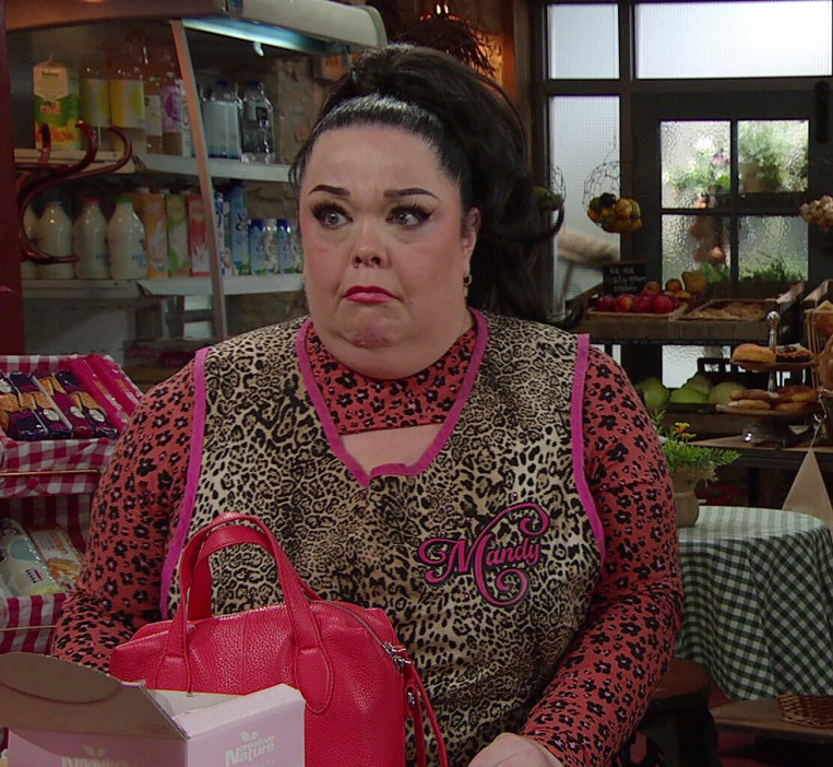 FROM ITV..STRICT EMBARGO - No Use Before Tuesday 10th September 2024..Emmerdale - Ep 10092..Tuesday 17th September 2024..Mandy Dingle [LISA RILEY] has a surprise invitation..Picture contact - David.crook@itv.com..This photograph is (C) ITV and can only be reproduced for editorial purposes directly in connection with the programme or event mentioned above, or ITV plc. This photograph must not be manipulated [excluding basic cropping] in a manner which alters the visual appearance of the person photographed deemed detrimental or inappropriate by ITV plc Picture Desk. This photograph must not be syndicated to any other company, publication or website, or permanently archived, without the express written permission of ITV Picture Desk. Full Terms and conditions are available on the website www.itv.com/presscentre/itvpictures/terms.