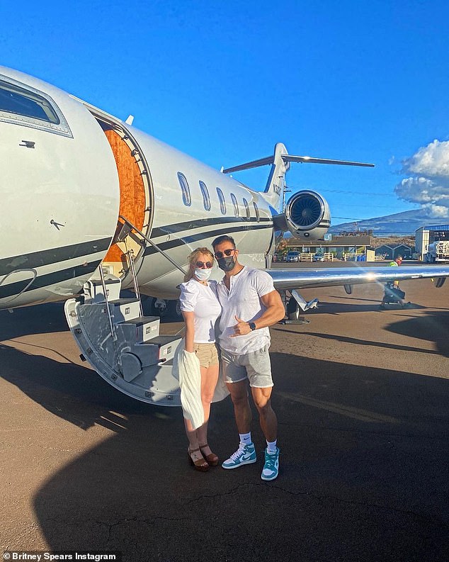 Spears starting drinking, before lighting up a cigarette and smoking it, per TMZ . It was reported flight attendants were 'alarmed and ordered her to put out the cigarette' - with the singer complying - she's pictured 2020 by a private jet with ex Sam Asghari