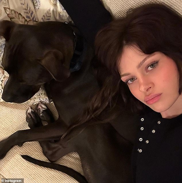 The Last Airbender actress Nicola, 30, can be seen cuddling up to Houdini in cute photos posted to Instagram