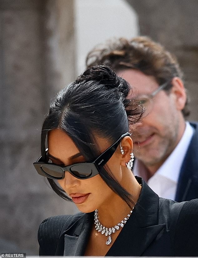 Kardashian described how they tied her hands with cable ties, dragged her to the bathtub and pointed a gun at her temple