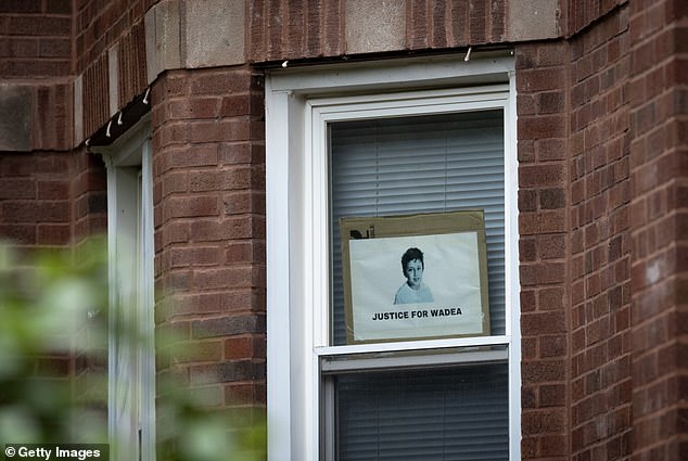 A sign in Rodriguez's apartment window that calls for 'Justice for Wadea', a six-year-old Palestinian American boy who was stabbed to death by his family's landlord in Chicago