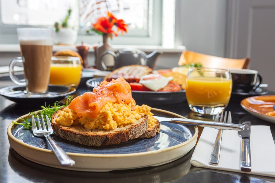 Scrambled eggs with smoked salmon on toast.