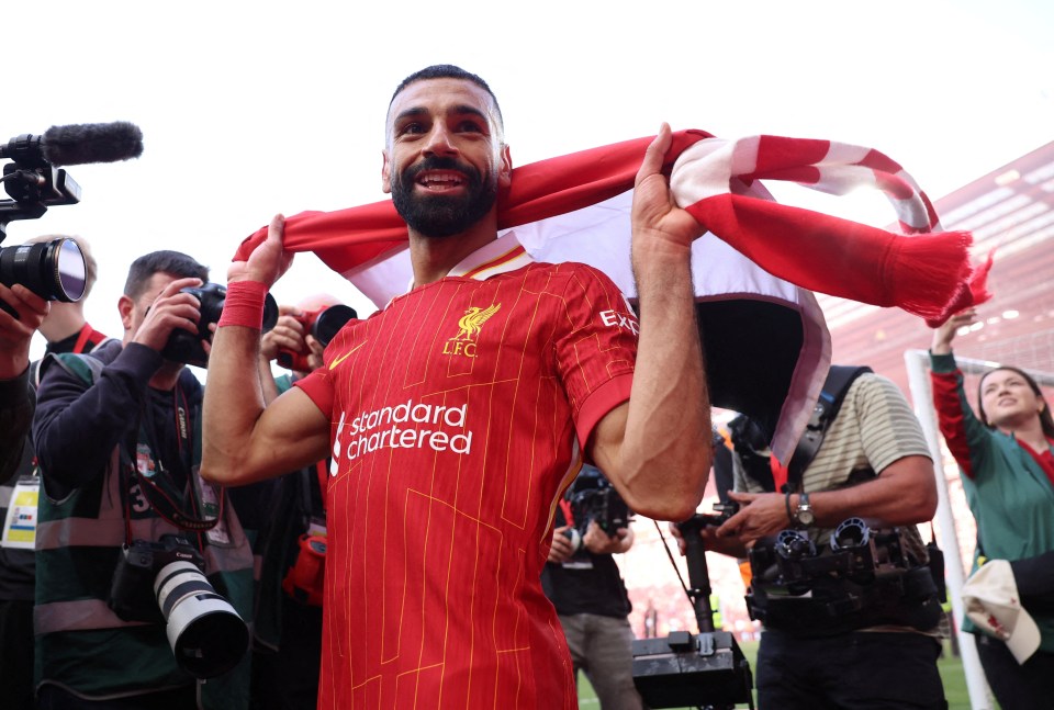 Mohamed Salah celebrating in a Liverpool jersey.