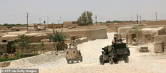 British soldiers from Task Force Helmand on patrol near provincial capital Lashkar Gah in 2006.