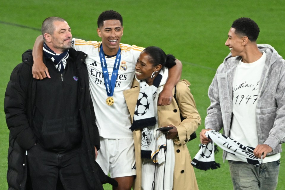 Jude Bellingham celebrates with his family after a football match.