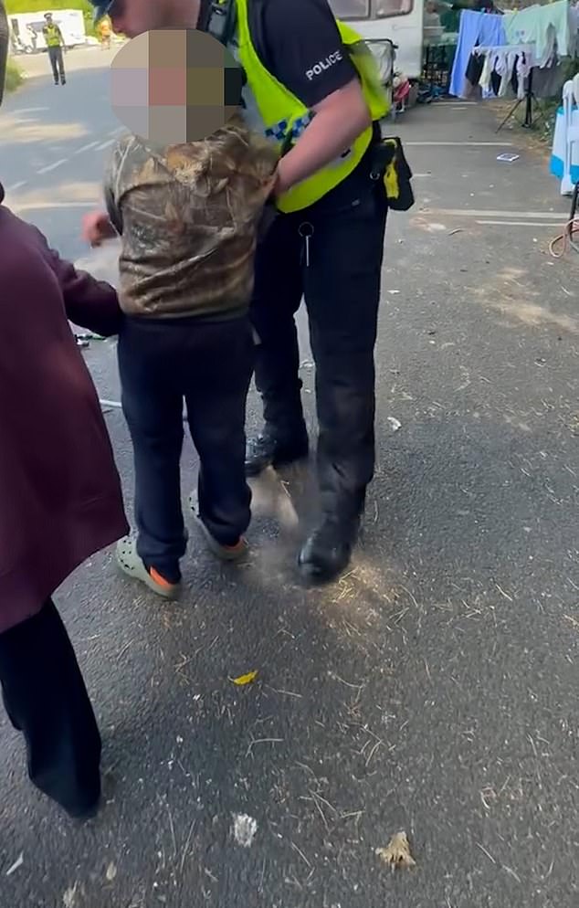 Footage of the incident shows one of the boys clearly becoming agitated after being handcuffed - with his mother also becoming tearful at the sight of her detained son