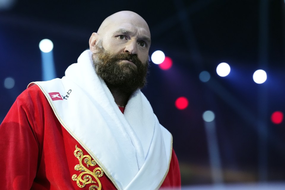 Photo of Tyson Fury in a red robe.