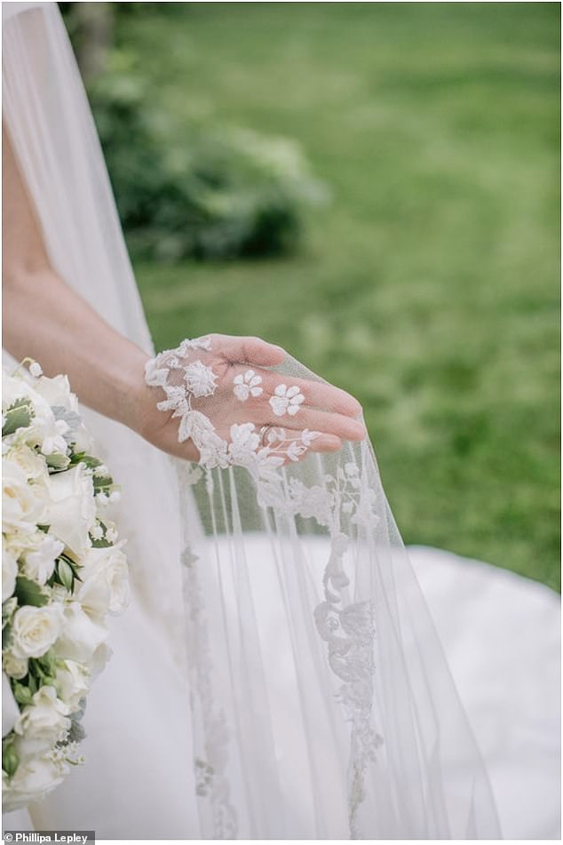 One bride requested her bespoke Phillipa Lepley veil be embroidered with paw prints from her beloved pet