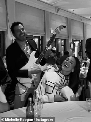 Michelle let loose and showed off her fun side as she larked around at the restaurant