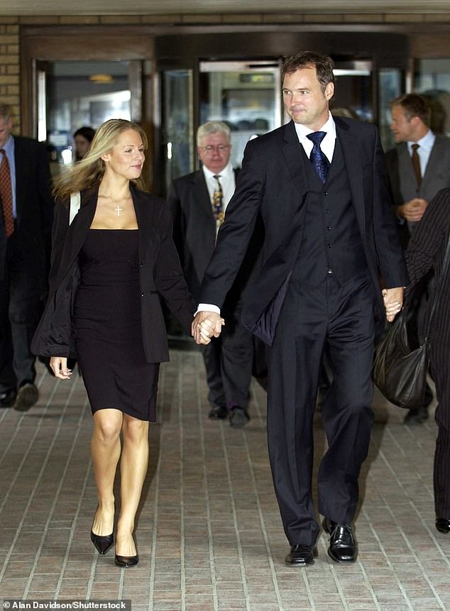 Abi became a lads mag favourite after her relationship with disgraced TV presenter John Leslie pushed her into the public eye (pictured in 2003)