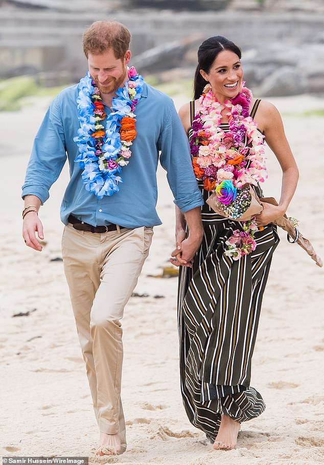 Unlike Kate Middleton and Princess Diana, Meghan chose to remove her shoes on Bondi beach