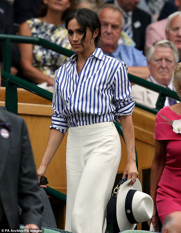 The Duchess of Sussex appeared at Wimbledon in Ralph Lauren which included a pair of trousers which are not the usual dress code for the Royal Box