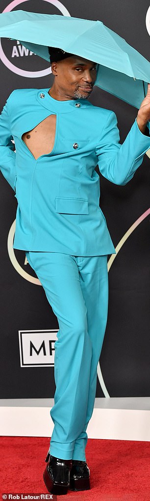 Billy Porter, 55, flashed a nipple as he donned a bright blue Tiffany suit with black platform boots in 2021