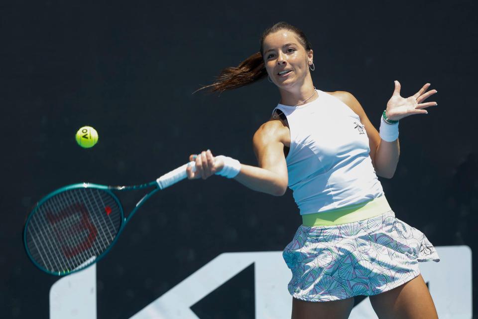 Jodie Burrage playing tennis at the Australian Open.